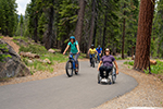 People biking and rolling on the Dollar Shared-Use Trail in Placer County.