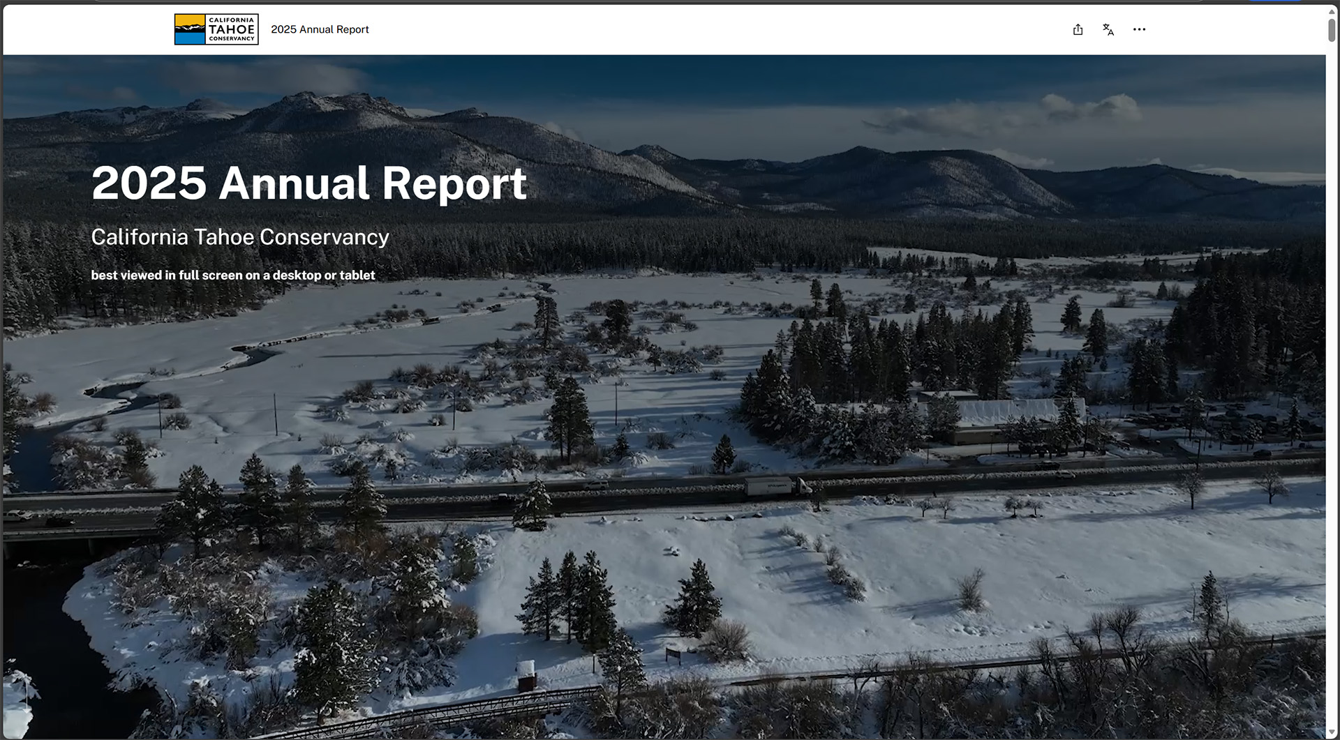 The Upper Truckee River next to snow-covered wetland, with Johnson Meadow beyond and mountains in the distance.